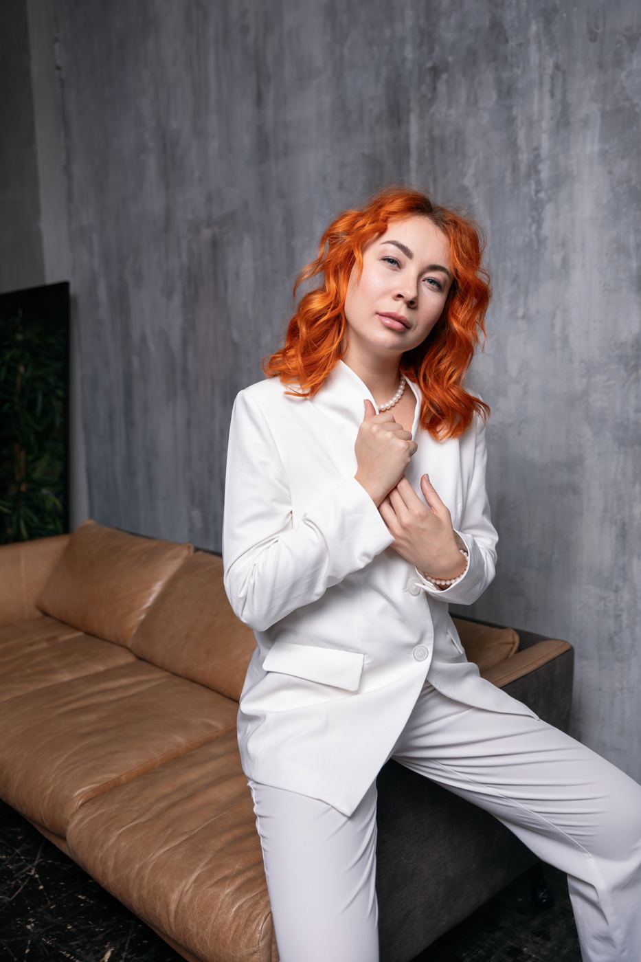 Victoria Soboleva in a white suit